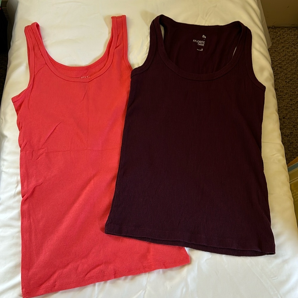 Lot of two tank tops. Pink tank top size small, purple size extra small
